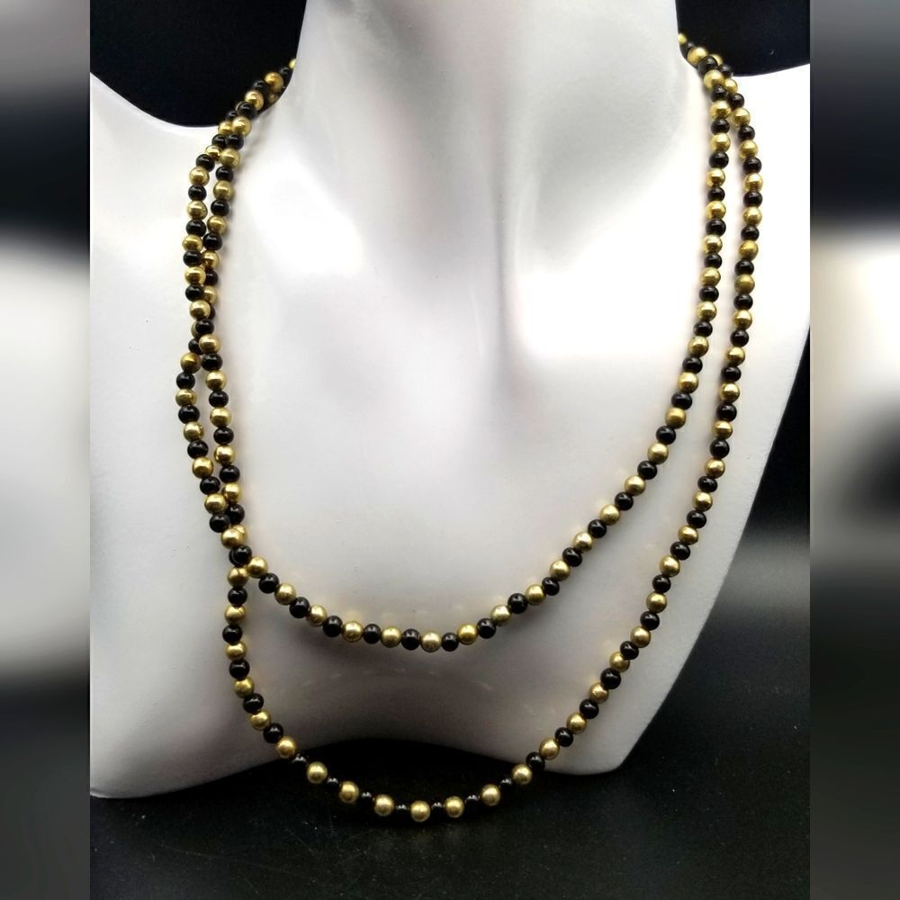 Royal gold tone and metalic black dinner necklace. N129